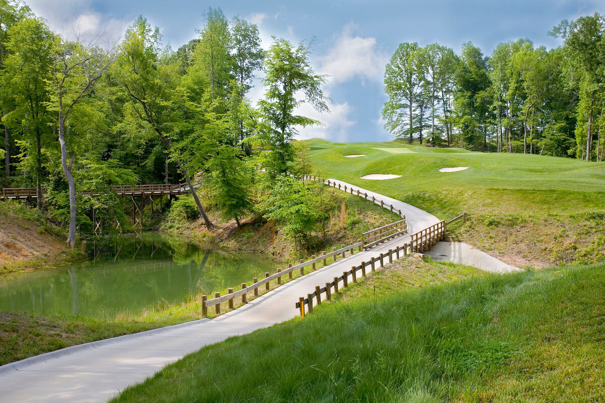 Cart path bridge over water at Colonial Heritage golf course